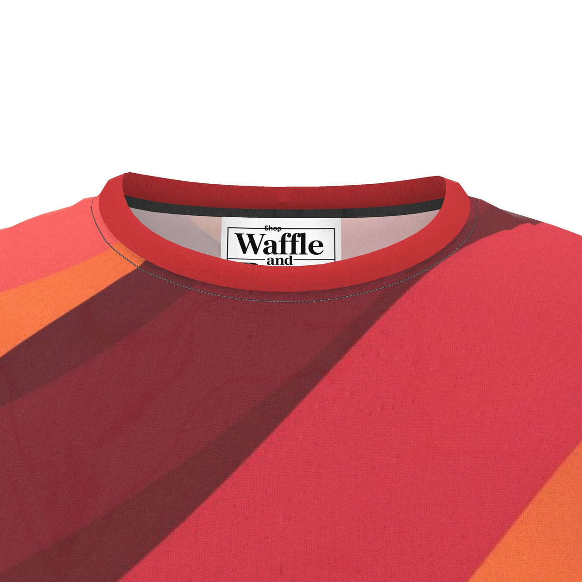 Solar Current T-shirt detail showing the red crew neck, warm-color printed fabric and inside label.