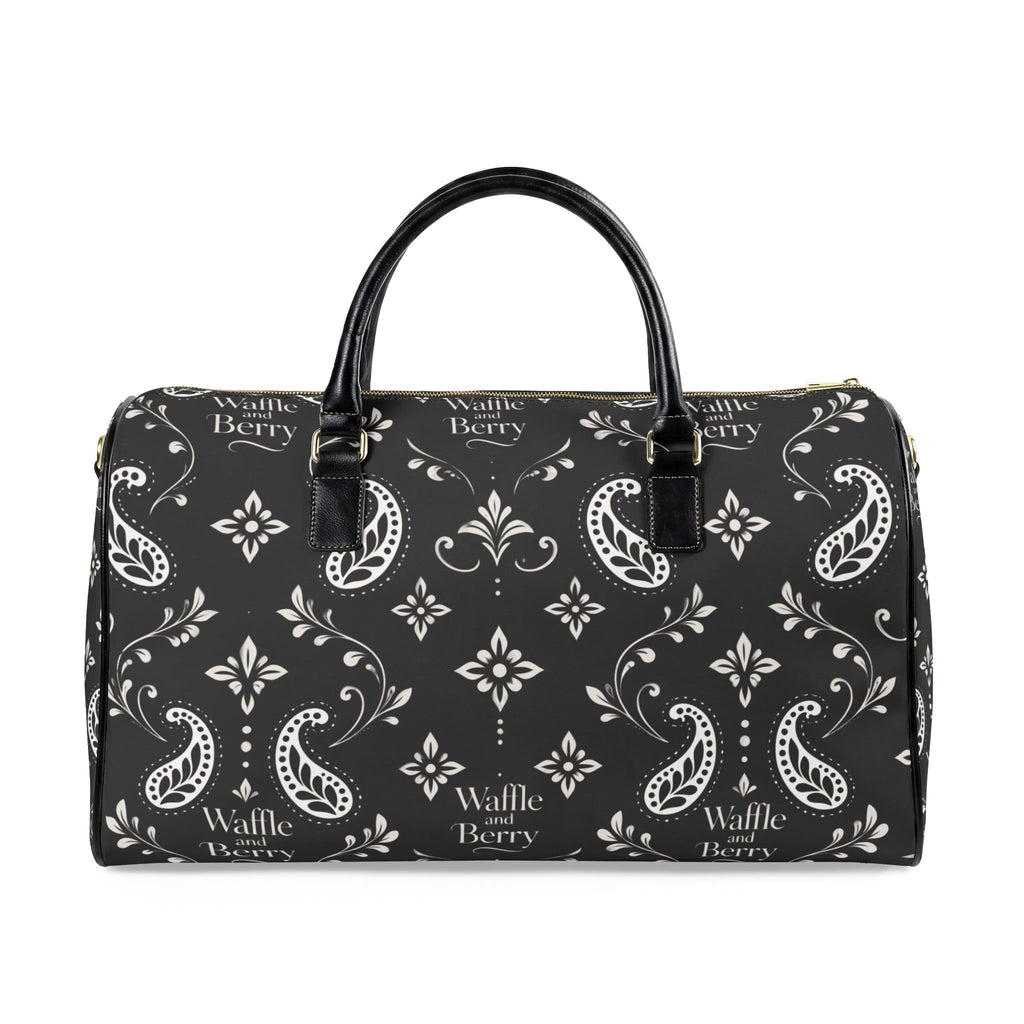 Black Paisley travel bag, opposite broad side with cream floral and paisley pattern and black handles.