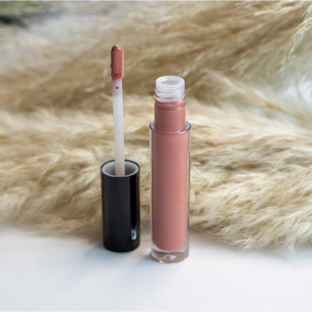 Supplier applicator reference showing tinted pink gloss, not the Clear shade sold on this page.