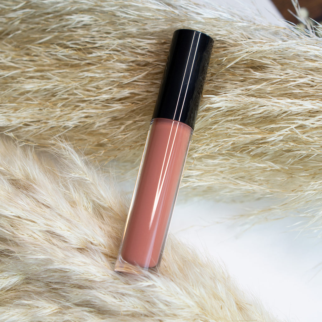 Supplier range lifestyle reference showing tinted pink gloss, not the Clear shade sold on this page.