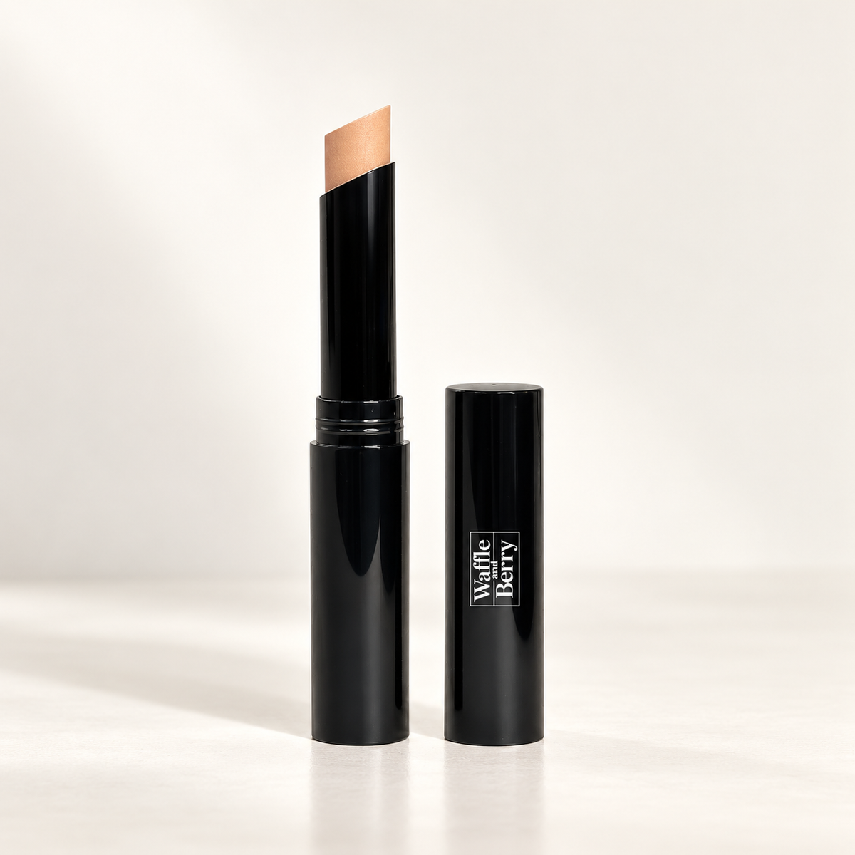 AI-generated editorial illustration of Almond LW2 concealer product detail. Not evidence of coverage or skin results. Styling props not included; see authentic supplier image and range chart for shade.