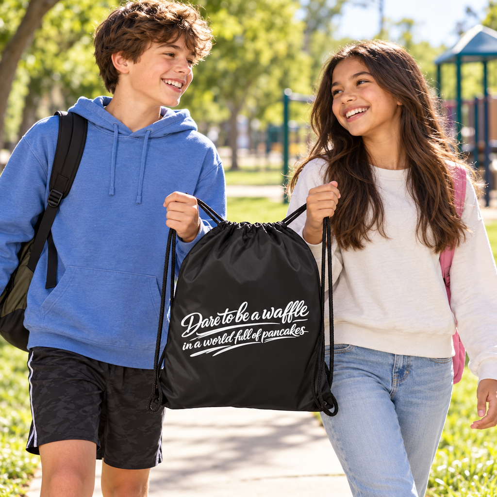 Two kids carrying the black Dare Bag Me drawstring bag together