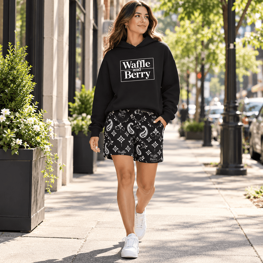 Model wearing Waffle and Berry Hoodie and paisley shorts, walking