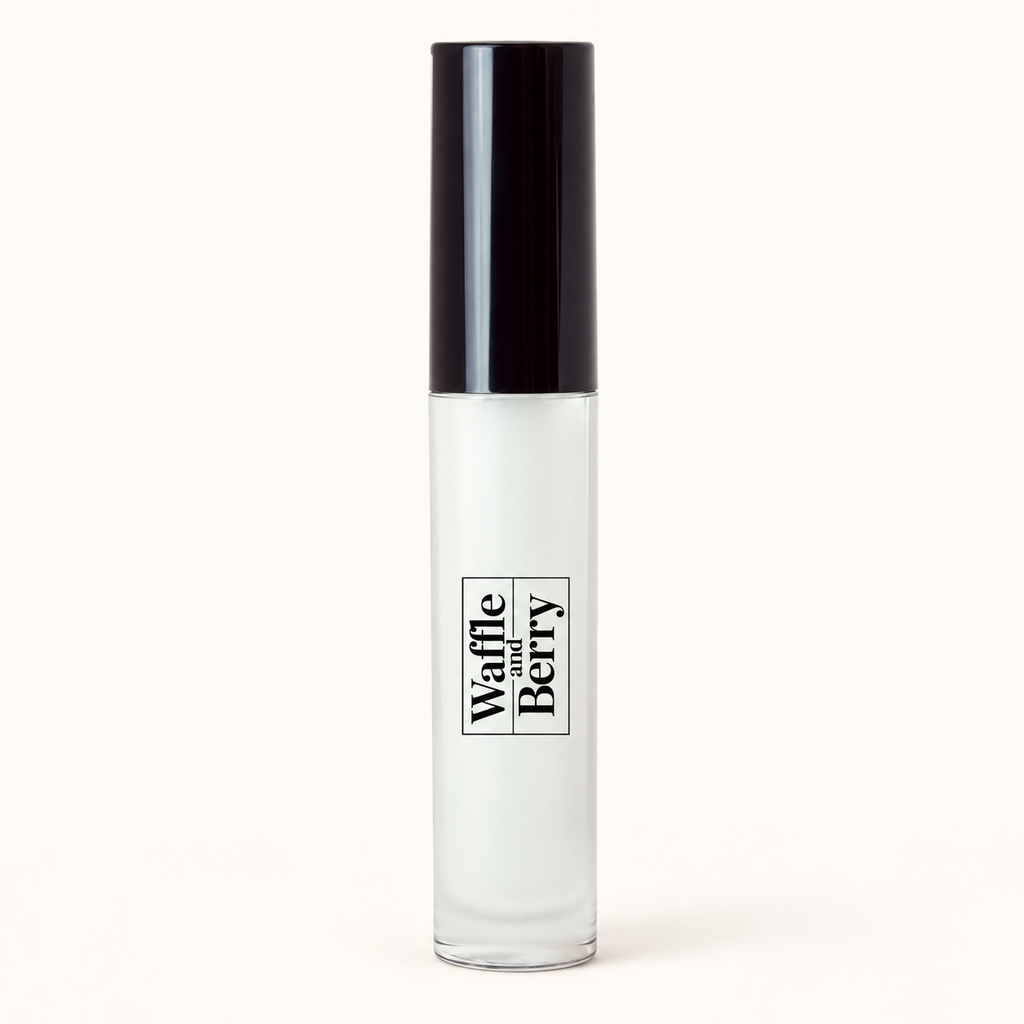 AI-assisted close product-only packaging illustration of Waffle and Berry Clear lip gloss.