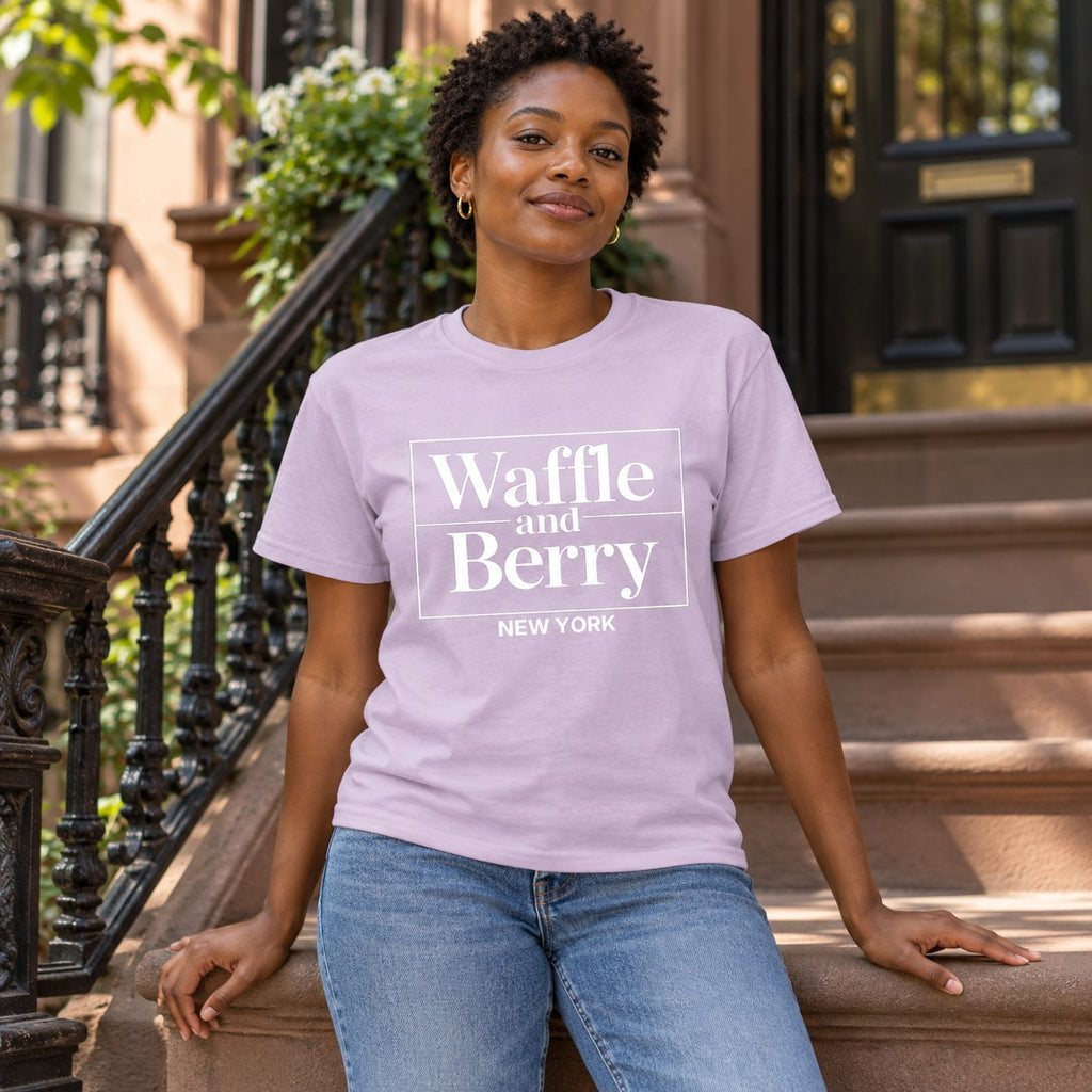 Illustrative model wearing the Orchid Waffle and Berry NEW YORK T-shirt on a New York brownstone stoop.