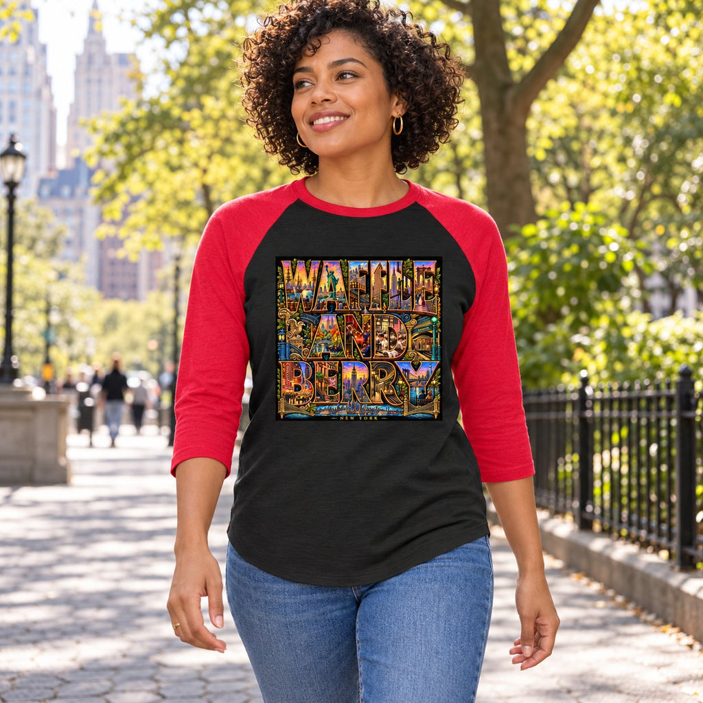 Illustrative model wearing the Black/Red New York Wins raglan shirt beside a New York park, front view.
