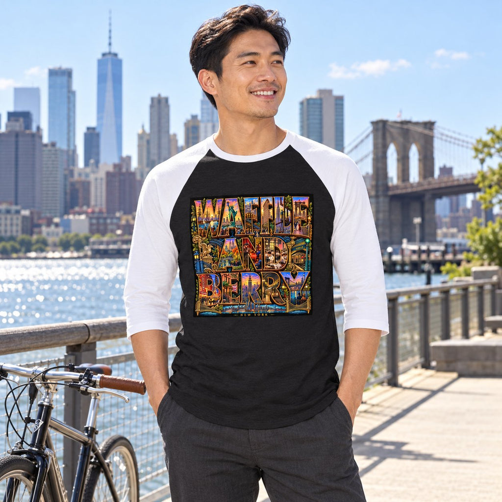Illustrative model wearing the Black/White New York Wins raglan shirt beside a bicycle on the New York waterfront, front view.