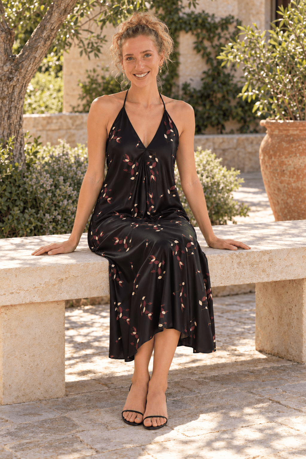 AI styling preview: Evening Petals midi halterneck dress. Illustrative fit and print placement; refer to original supplier product views and size guides.
