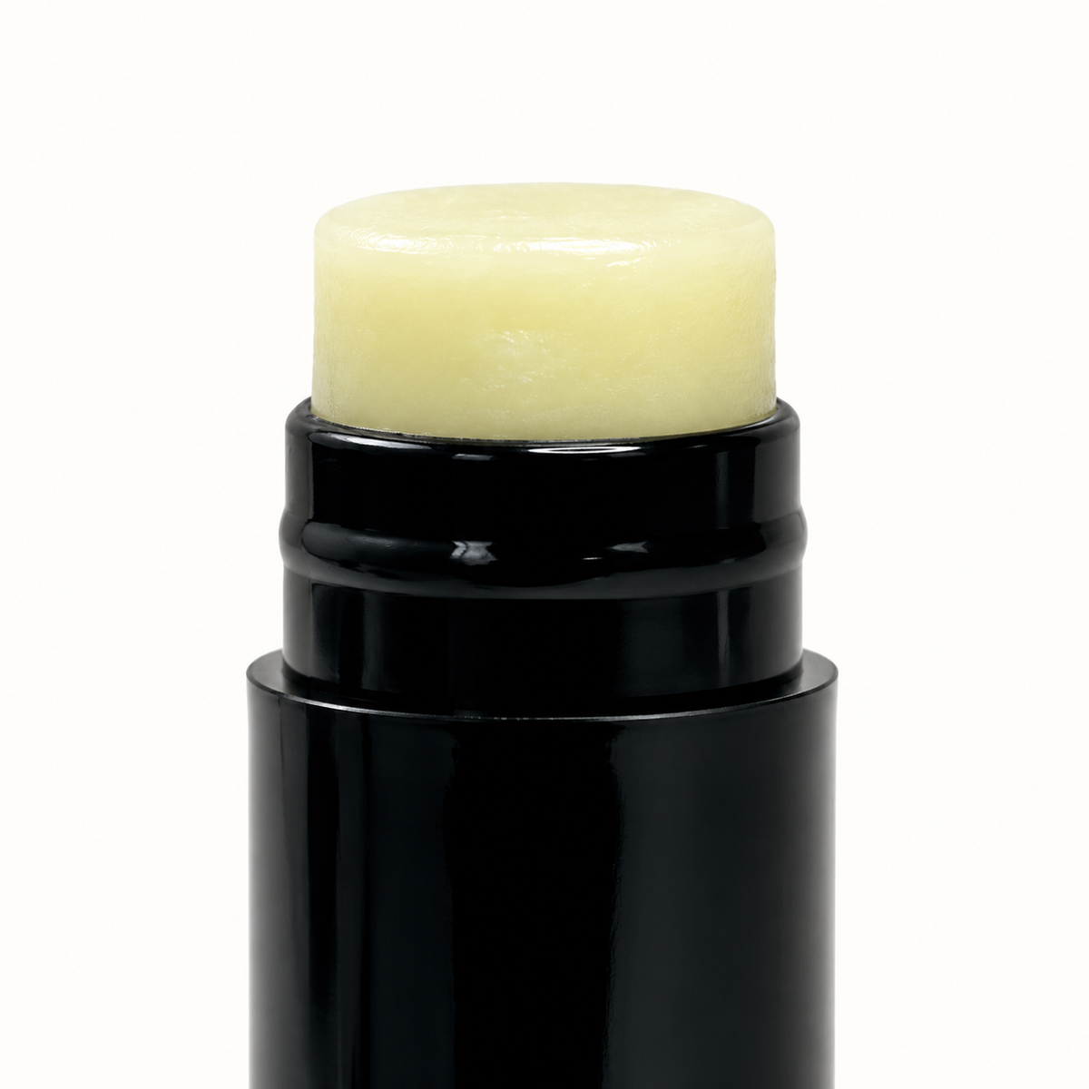 AI-assisted close-up product illustration of Vegan Lip Balm tip and upper tube, based on supplier reference.