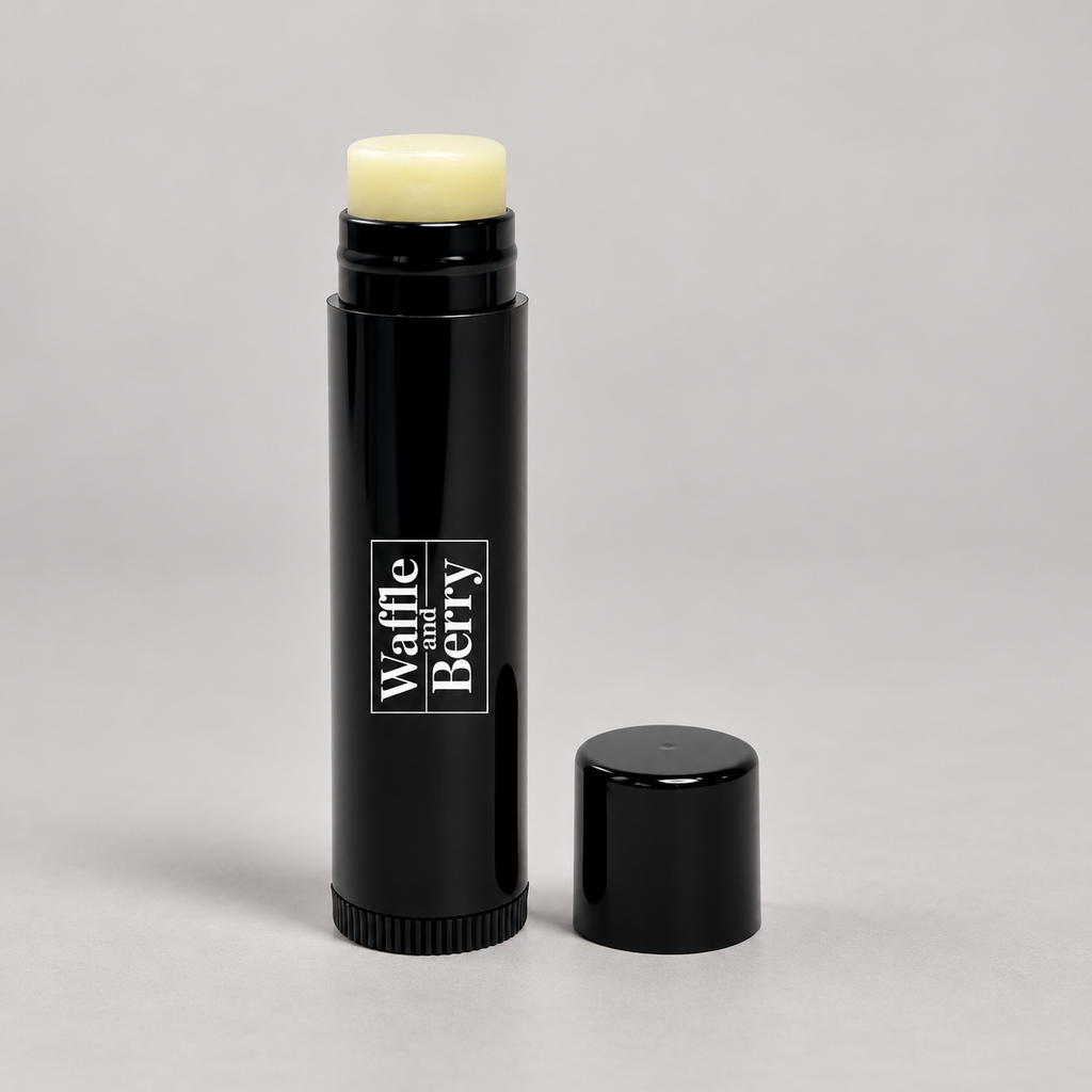 AI-assisted product illustration of Waffle and Berry Vegan Lip Balm and cap on a gray studio background; based on the supplier reference.