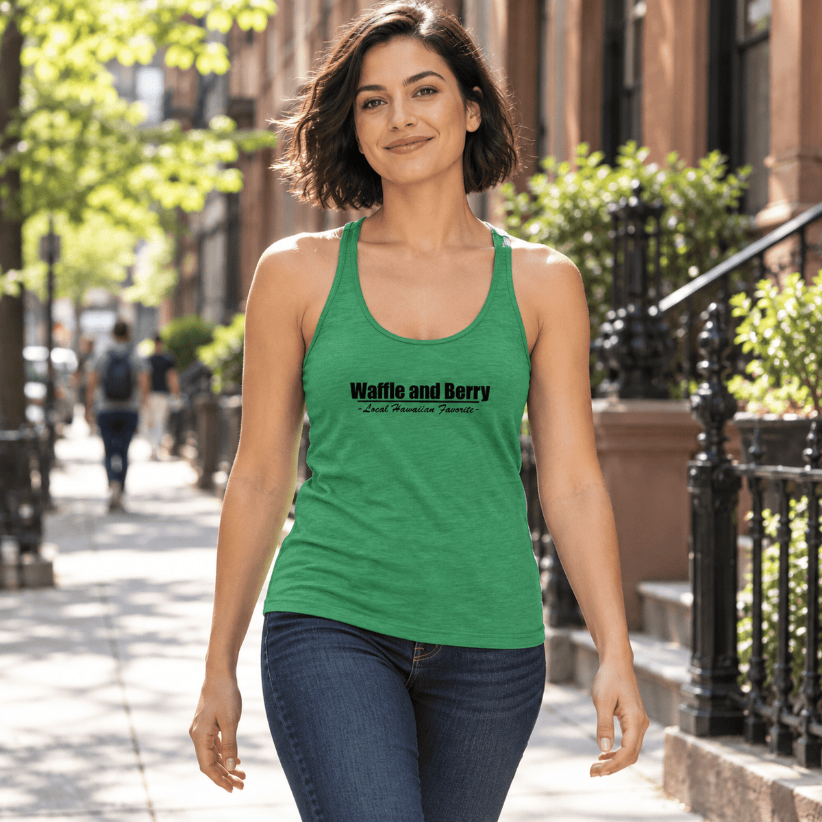 Model wearing the Envy green Waffle and Berry racerback tank on a New York City sidewalk