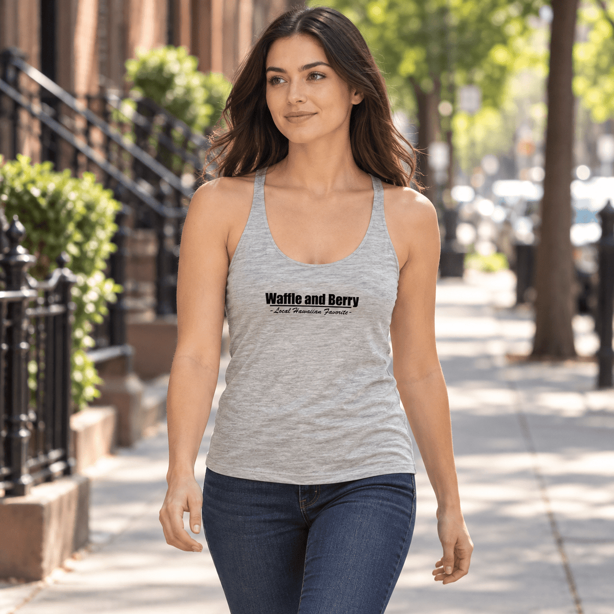 Model wearing the Heather White Waffle and Berry racerback tank on a sunlit New York City sidewalk